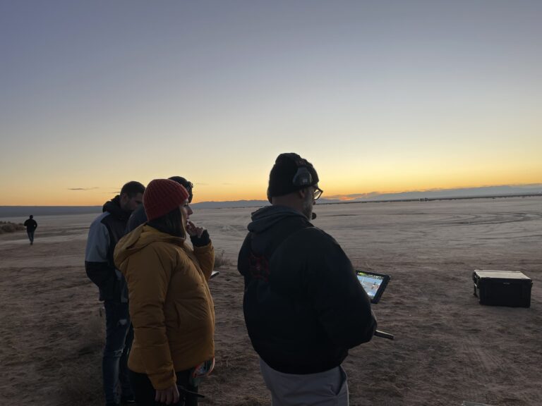 Crew reviewing footage on location