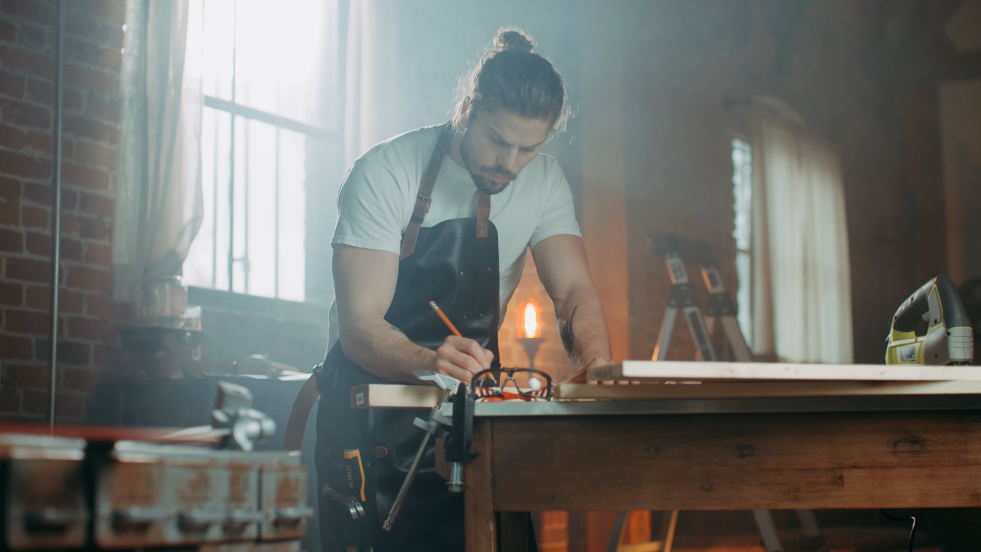 Leather apron on a workbench, e-commerce product video still